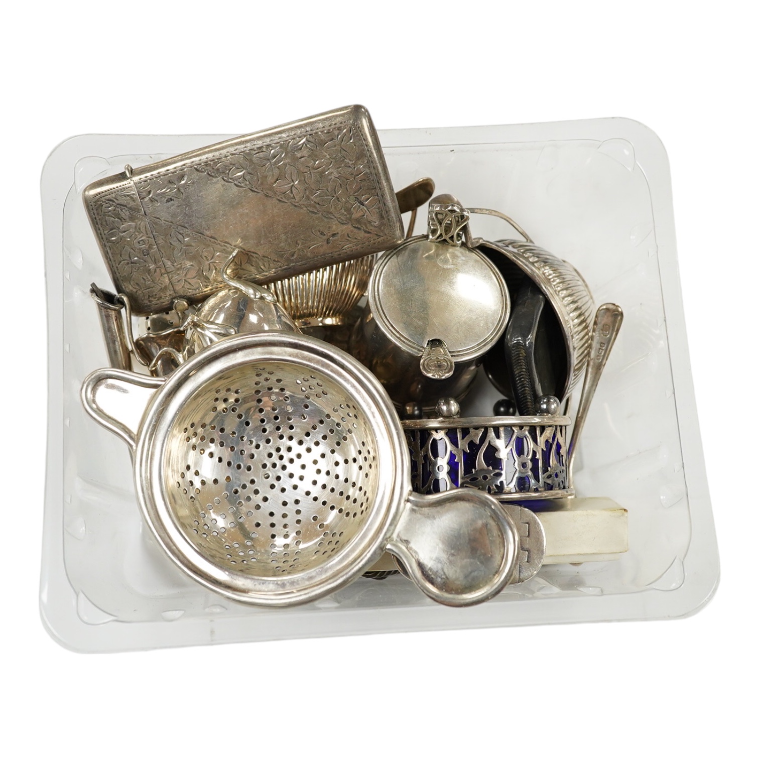 A collection of small collectable silver including card cases, condiments, tea strainer, sovereign case (a.f.) etc. Condition - poor to fair